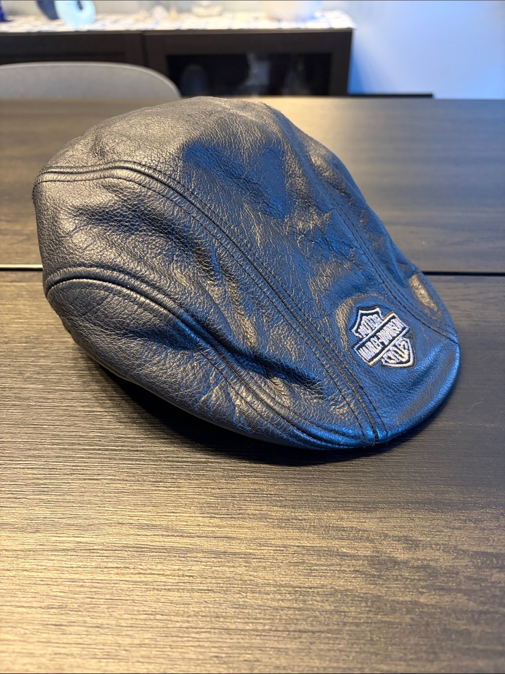 Vintage 2006 Harley-Davidson Black Leather Driving Cap with Embroidered Shield